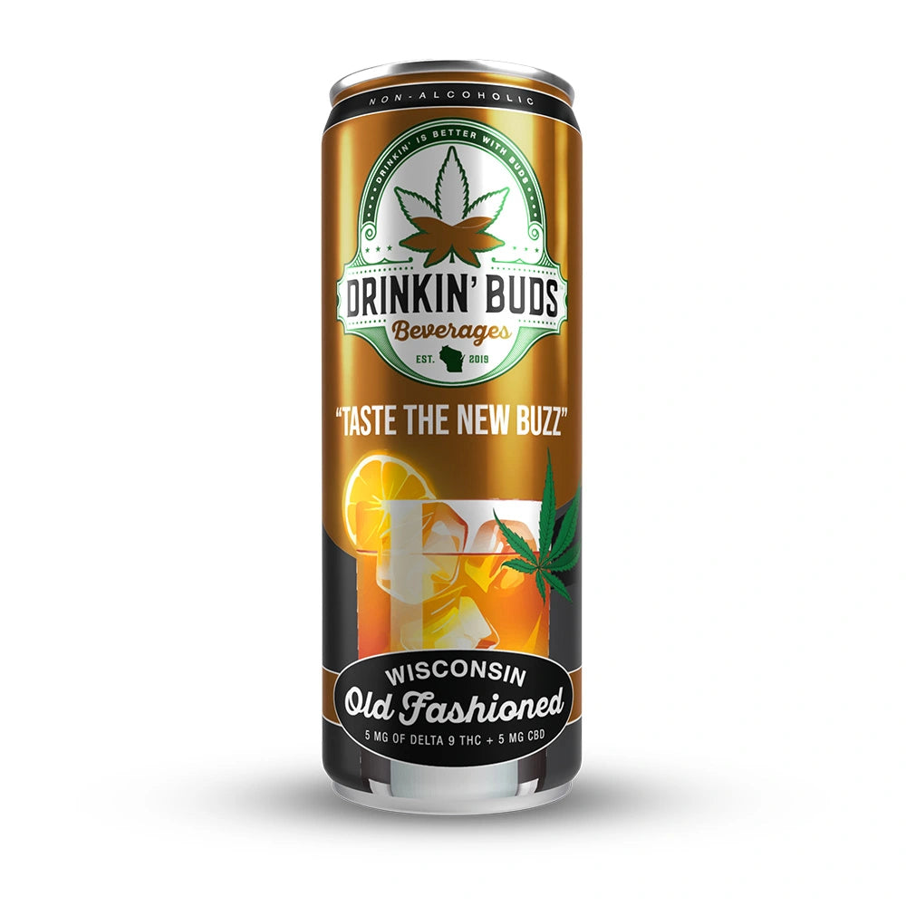 A tall can of Drinkin’ Buds Wisconsin Old Fashioned, a non-alcoholic THC and CBD-infused beverage, featuring a cannabis leaf logo and an illustration of a classic cocktail with orange slices and ice.