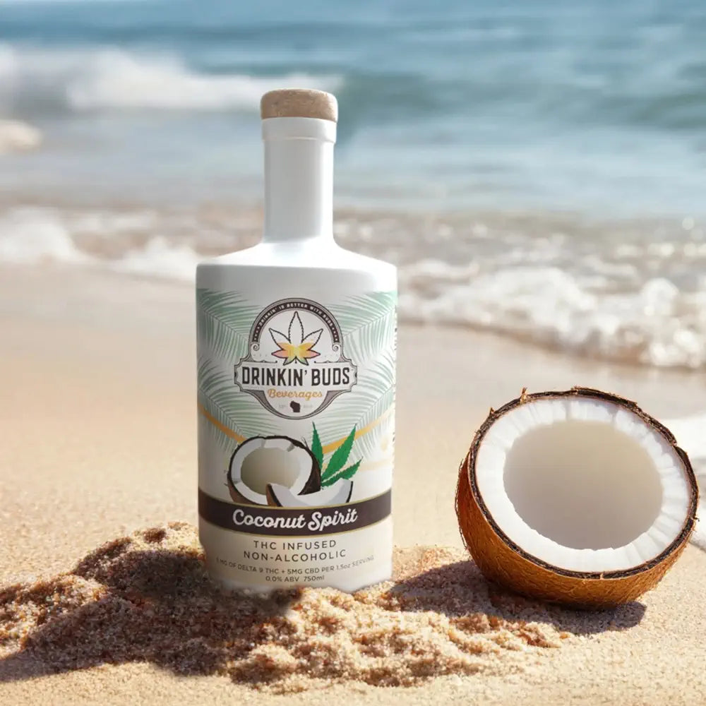 
                      
                        A white bottle of Drinkin' Buds Coconut Spirit features tropical graphics and is labeled as a THC-infused, non-alcoholic beverage.
                      
                    