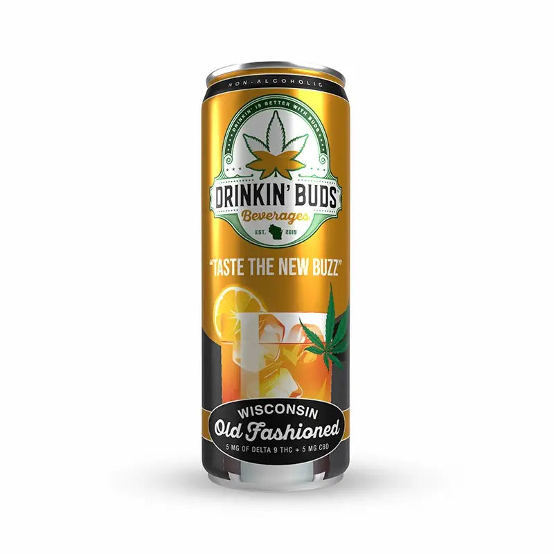 The image displays a single can of "Drinkin' Buds Beverages" in Wisconsin Old Fashioned flavor. The can features a gold label with the slogan "Taste the New Buzz," a graphic of an Old Fashioned cocktail with an orange slice and cherry, and cannabis leaf imagery, indicating the drink's infused nature with 5 mg of Delta 9 THC and 5 mg of CBD.