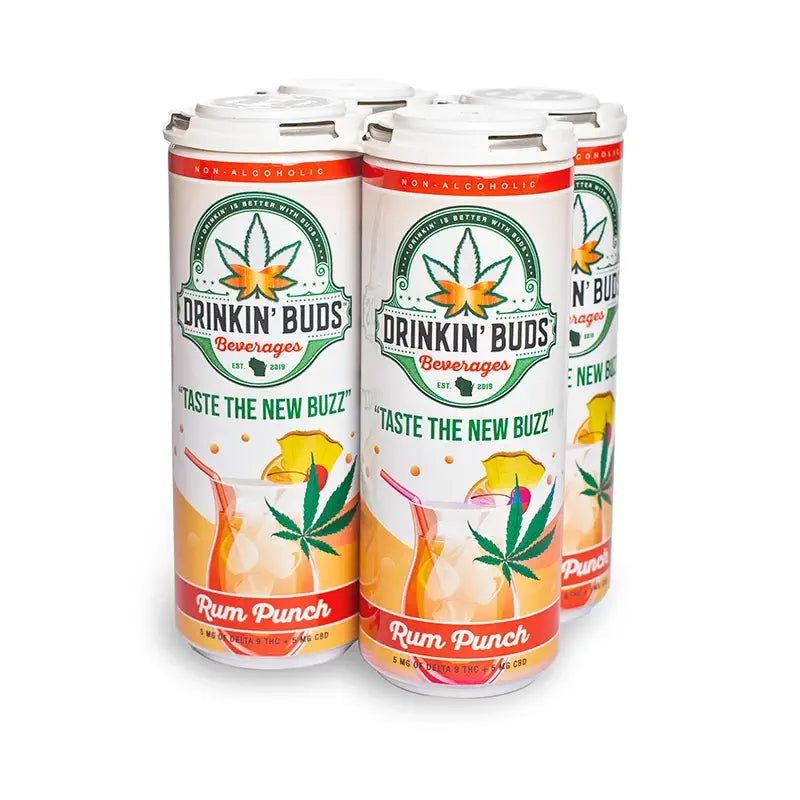 
                      
                        The image displays a four-pack of "Drinkin' Buds Beverages" Rum Punch flavor, featuring a white and orange design. The label includes a cannabis leaf, the slogan "Taste the New Buzz," and a vibrant rum punch cocktail graphic.
                      
                    