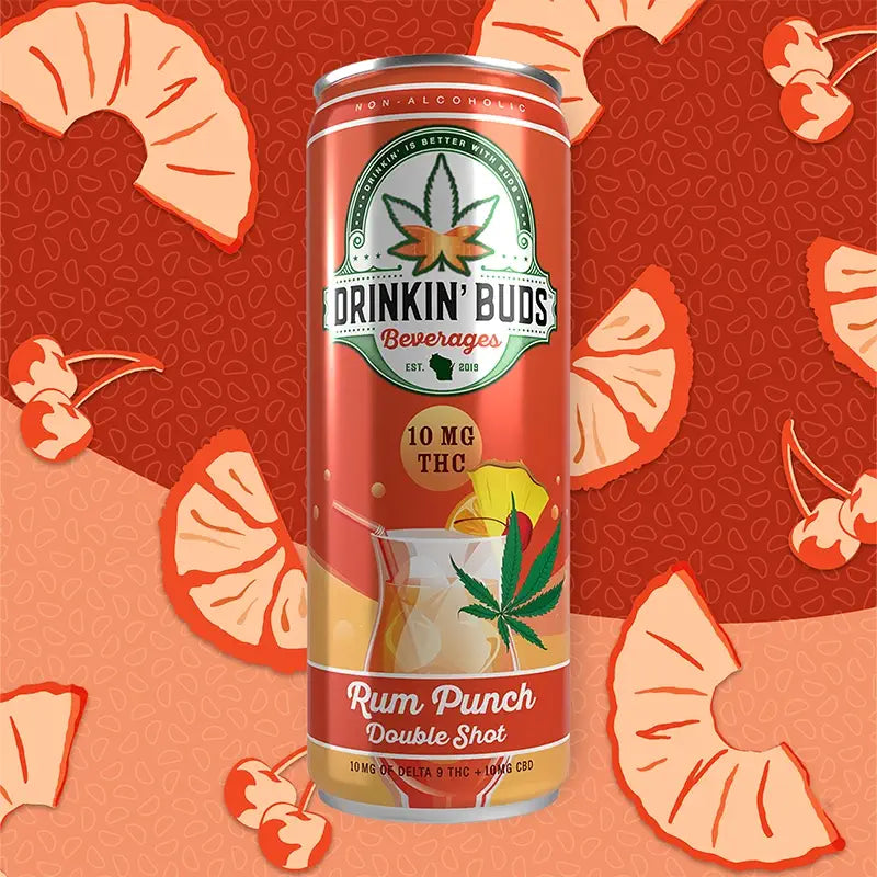 
                      
                        A can of Drinkin' Buds Rum Punch Double Shot with 10 mg THC, displayed against a vibrant background featuring illustrated pineapple slices and cherries.
                      
                    